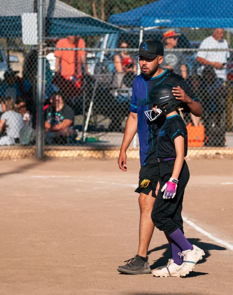 Image of Joshua as softball coach